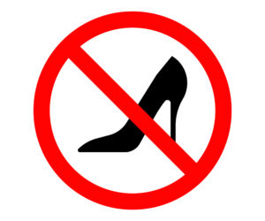 an illustration of high heels inside a prohibited sign