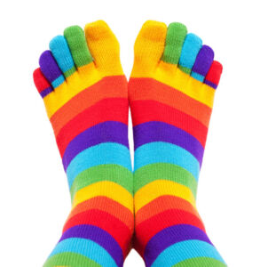 a photo of a pair of feet inside colourful toe socks